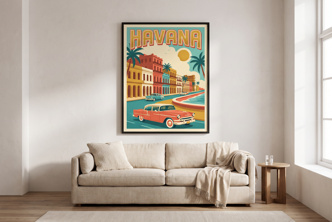 A large Havana travel print in a black frame hanging above a linen sofa