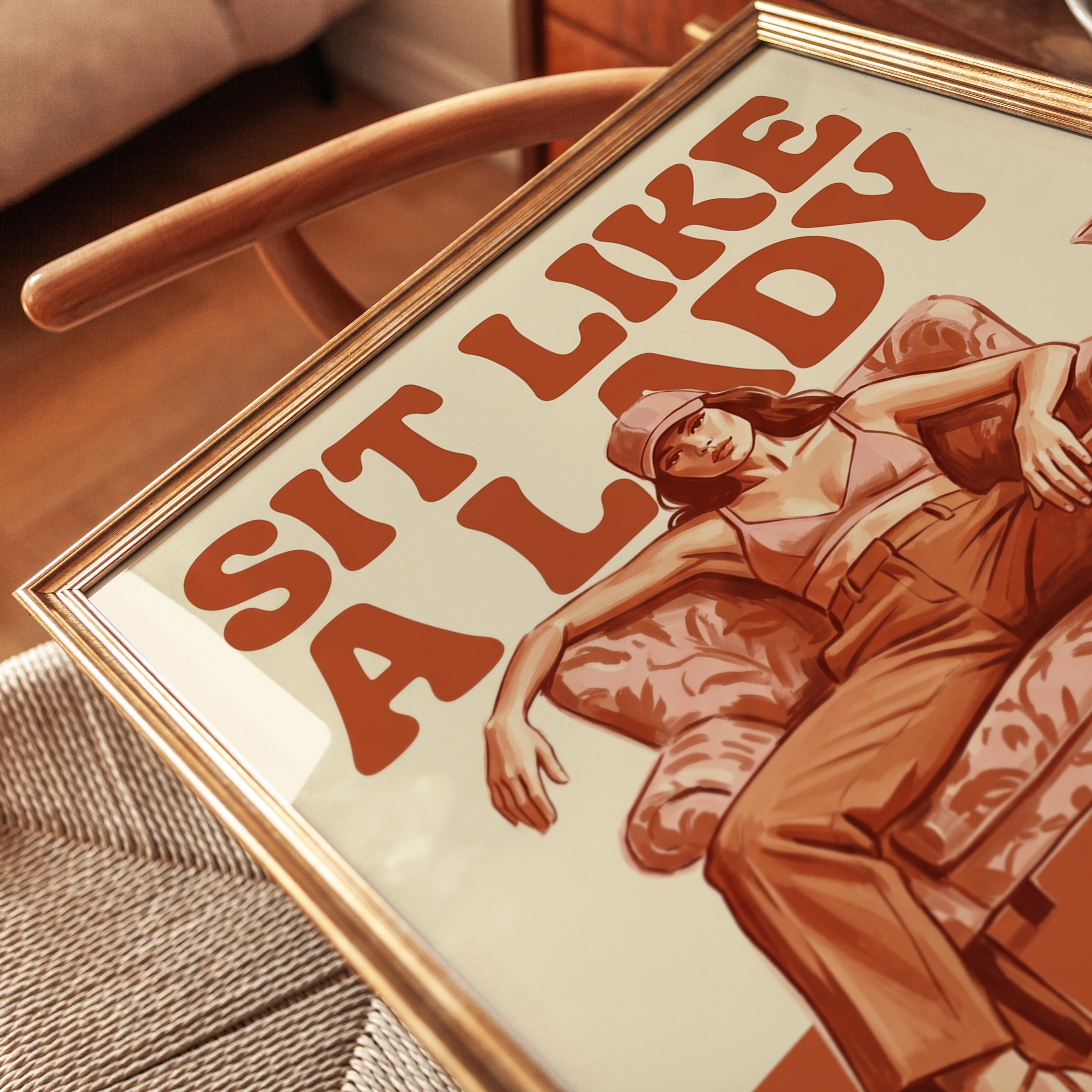 Sit Like A Lady Poster: Retro Feminist Art in Burnt Orange Tones - detail