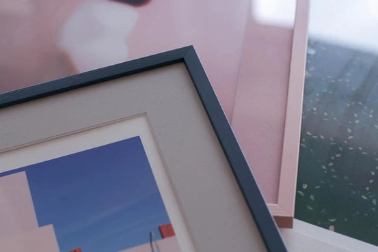 Close-up of a matte print inside a frame